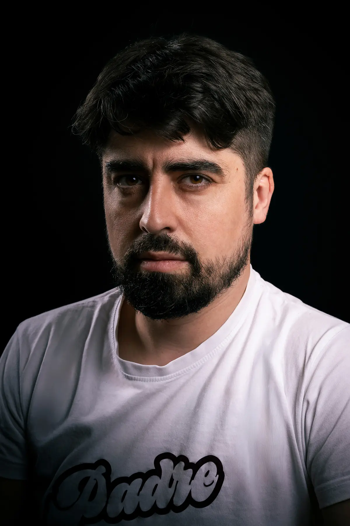 Marcin Zygmunt, portrait against a black background